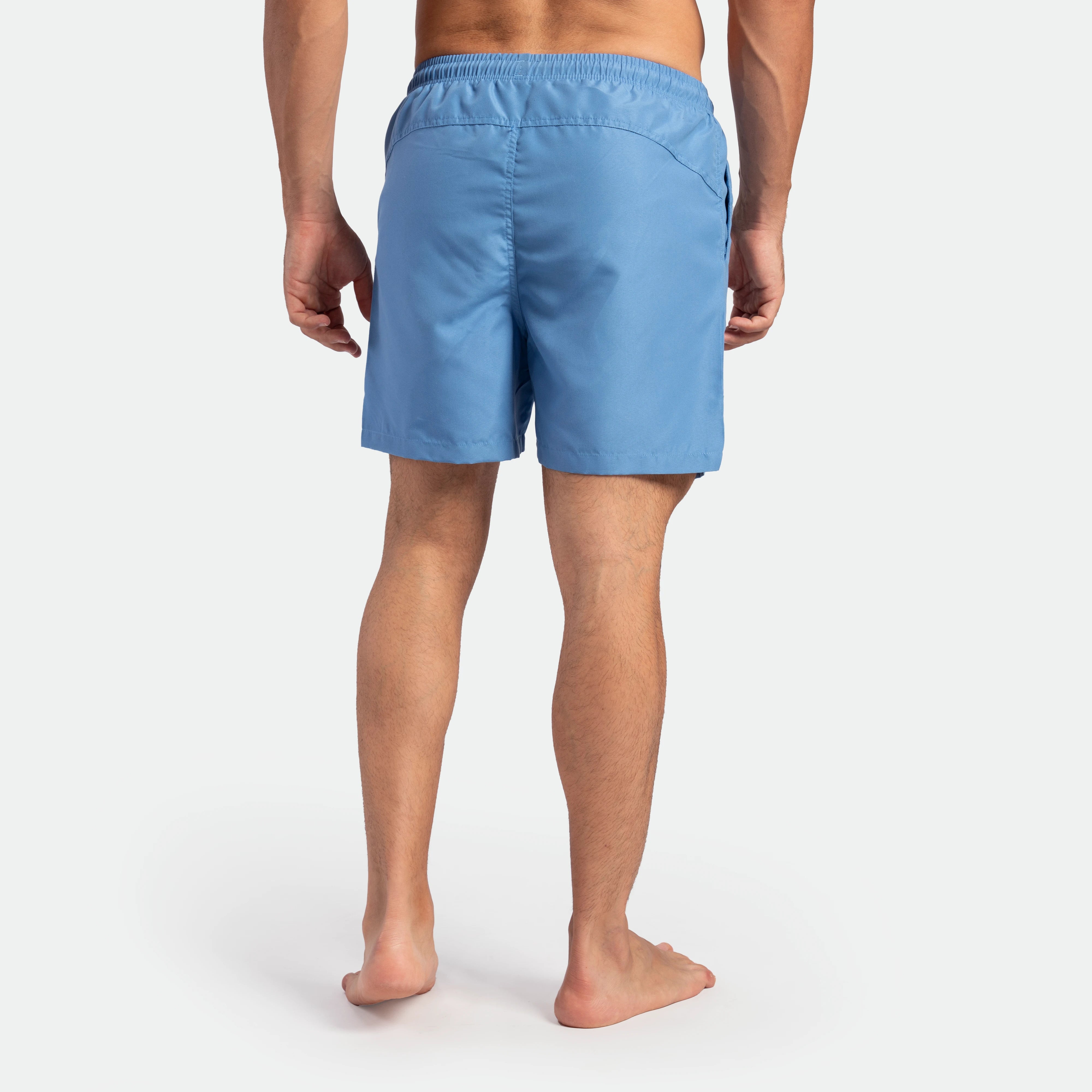 a back view for fit  man wearing short marina blue 