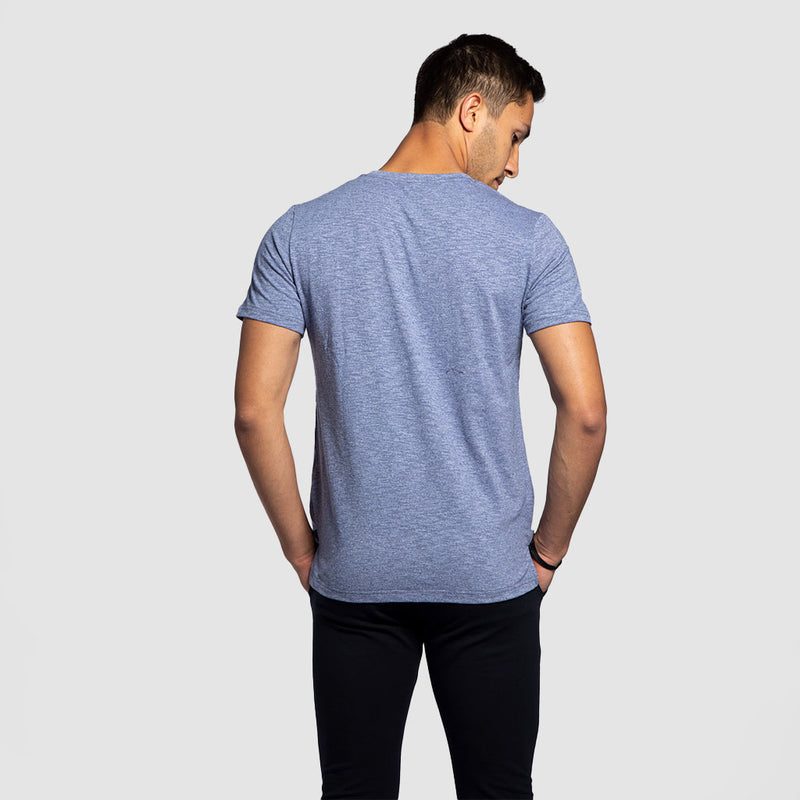a back view for fit man wearing t-shirt  marl blue with pants black 