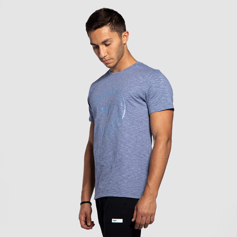 a fit man stand at right and wearing marl blue with logo and pants black 