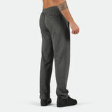 a back view for fit man wearing pants marl dark grey with shoes black 