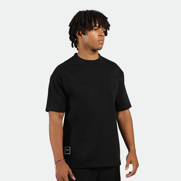a fit man wearing matching set black ,t-shirt and short 