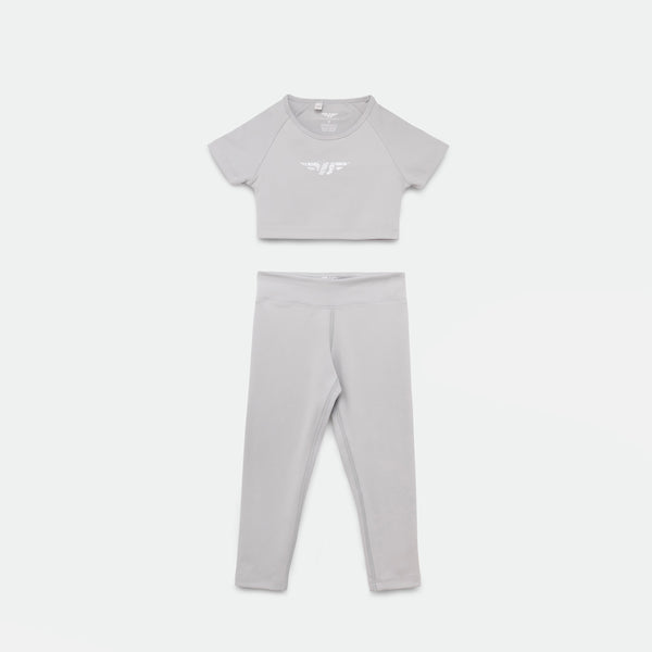 a matching set  grey crop top with logo and legging 