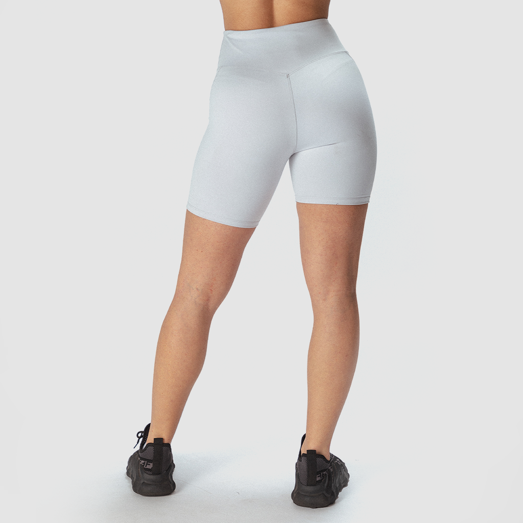 a back view for fit woman wearing short grey with shoes black 