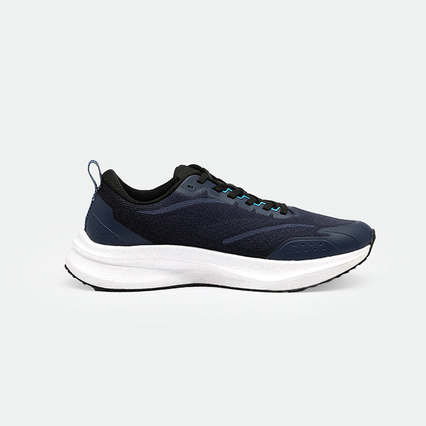 Dark navy sneaker with breathable mesh, black accents, blue eyelets, and a white sole, showcasing a sleek, modern design on a light gray background.