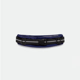 A navy blue belt bag with a black and gray adjustable strap. It has a central black buckle and a sleek, minimalist design on a light gray background.