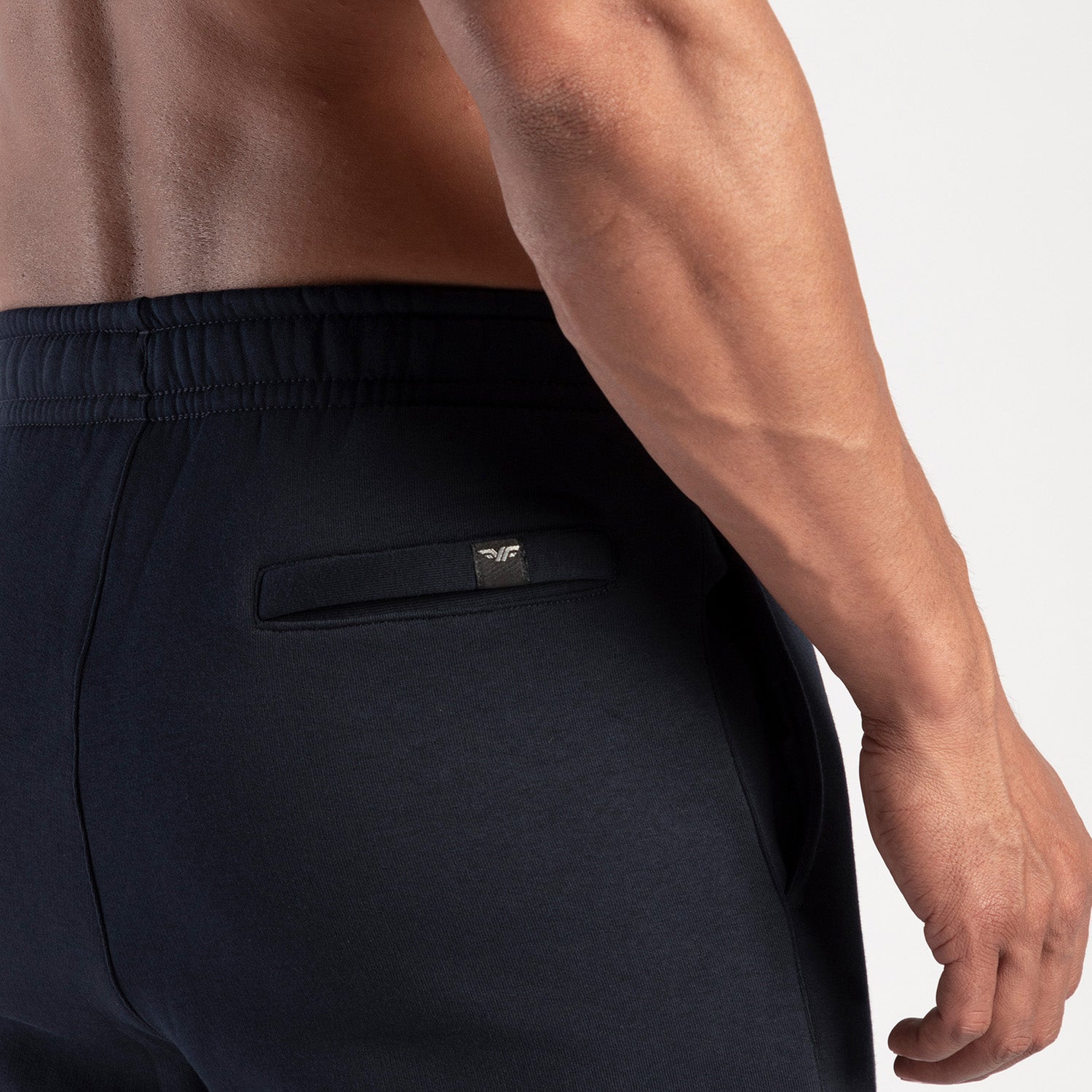 close up view for back view of man wearing pants navy 