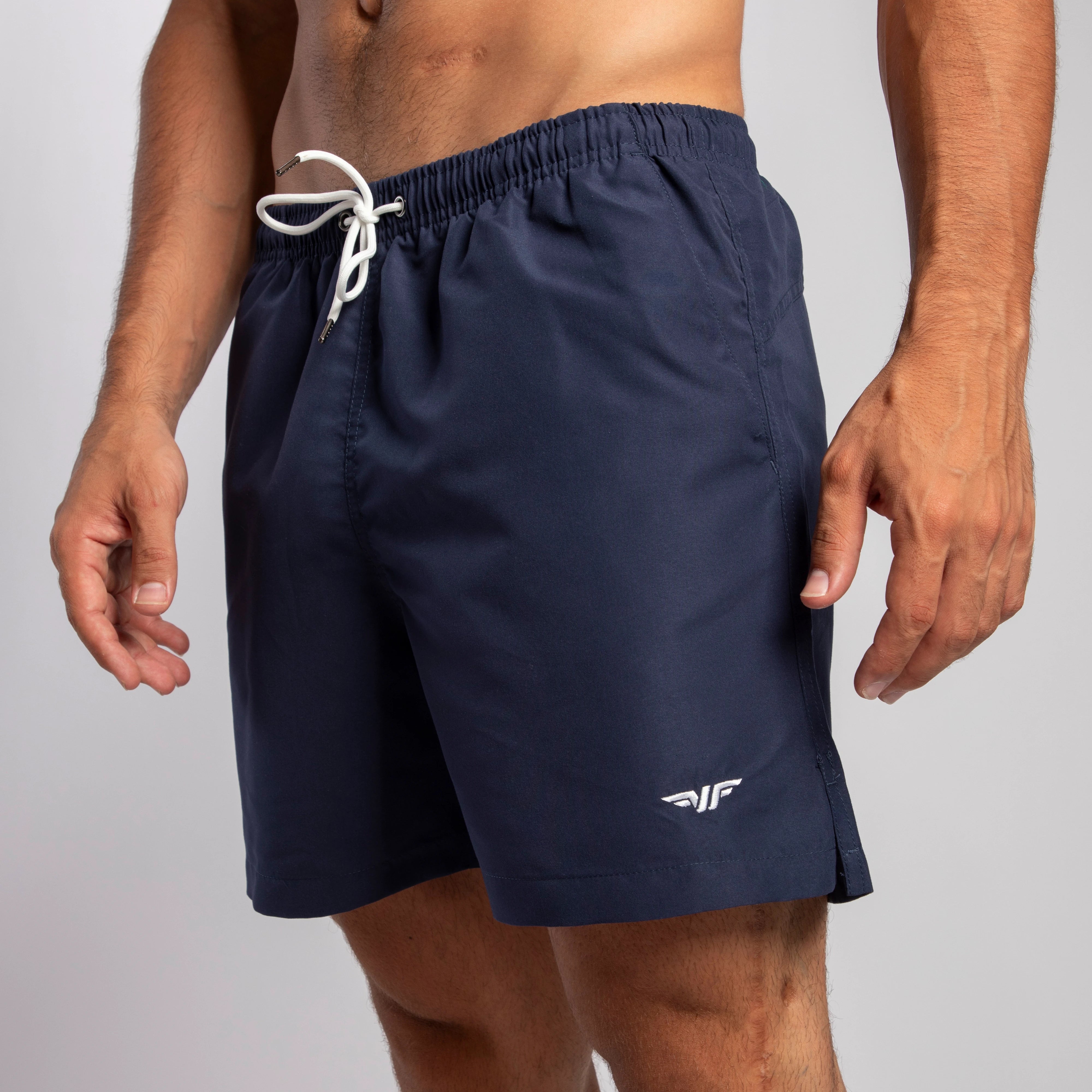 close up view for fit man wearing short navy blue 