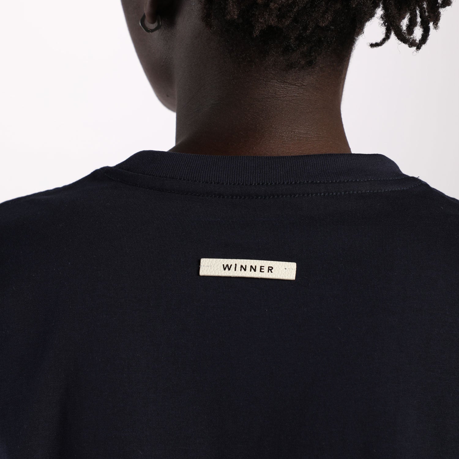 close up view for back view of t-shirt black with logo 