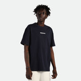 a fit man wearing t-shirt black with logo and pants beige 
