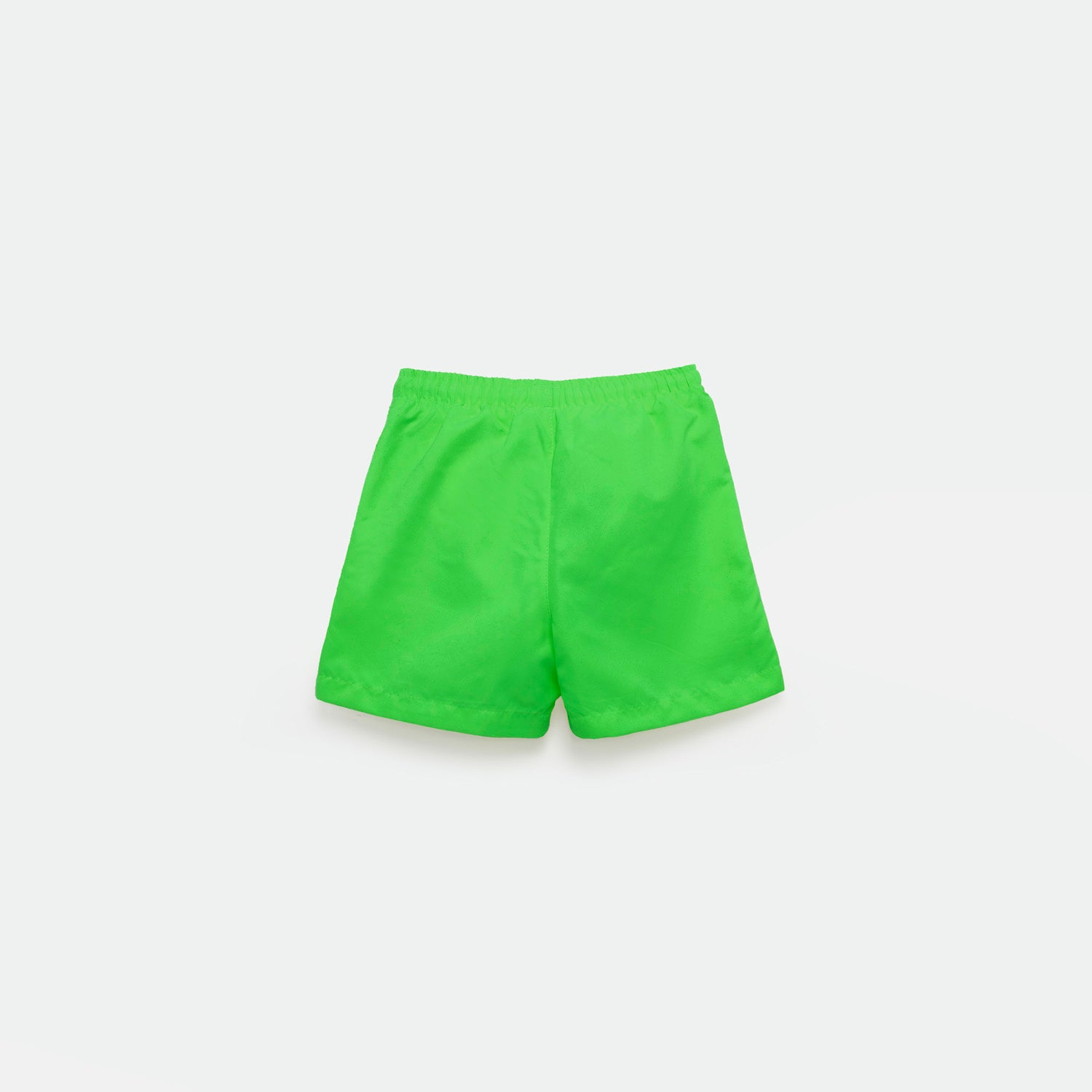 a back view  for short bright green with background light grey 
