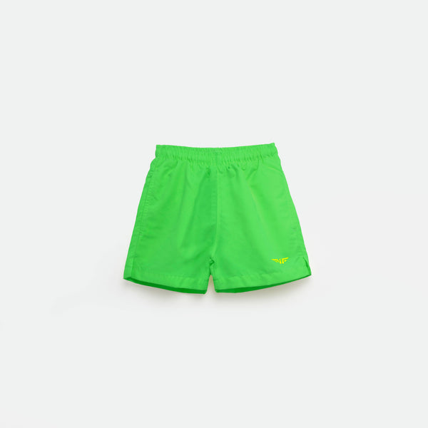 Bright green  athletic shorts laid flat on a light background. The shorts have a small white logo on the lower left side and feature a simple, sporty design