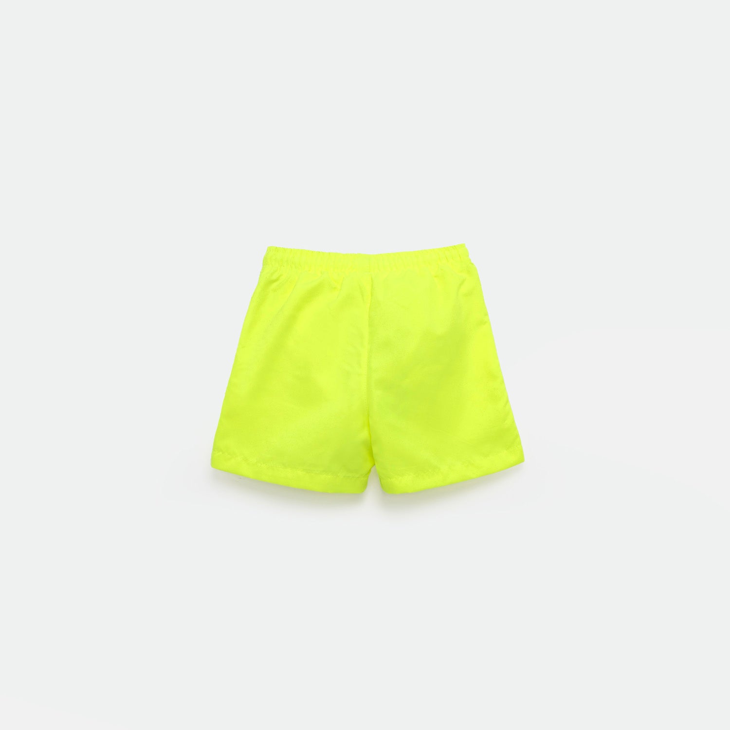 a back view for bright green short and background light grey 