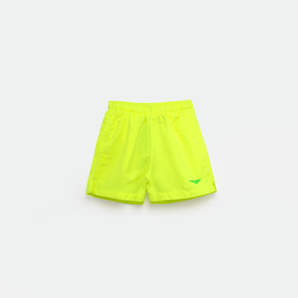 Bright  green  athletic shorts laid flat on a light background. The shorts have a small white logo on the lower left side and feature a simple, sporty design
