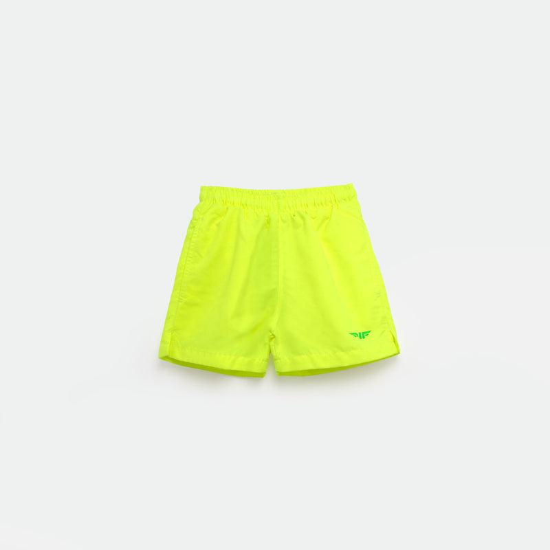 Bright  green  athletic shorts laid flat on a light background. The shorts have a small white logo on the lower left side and feature a simple, sporty design