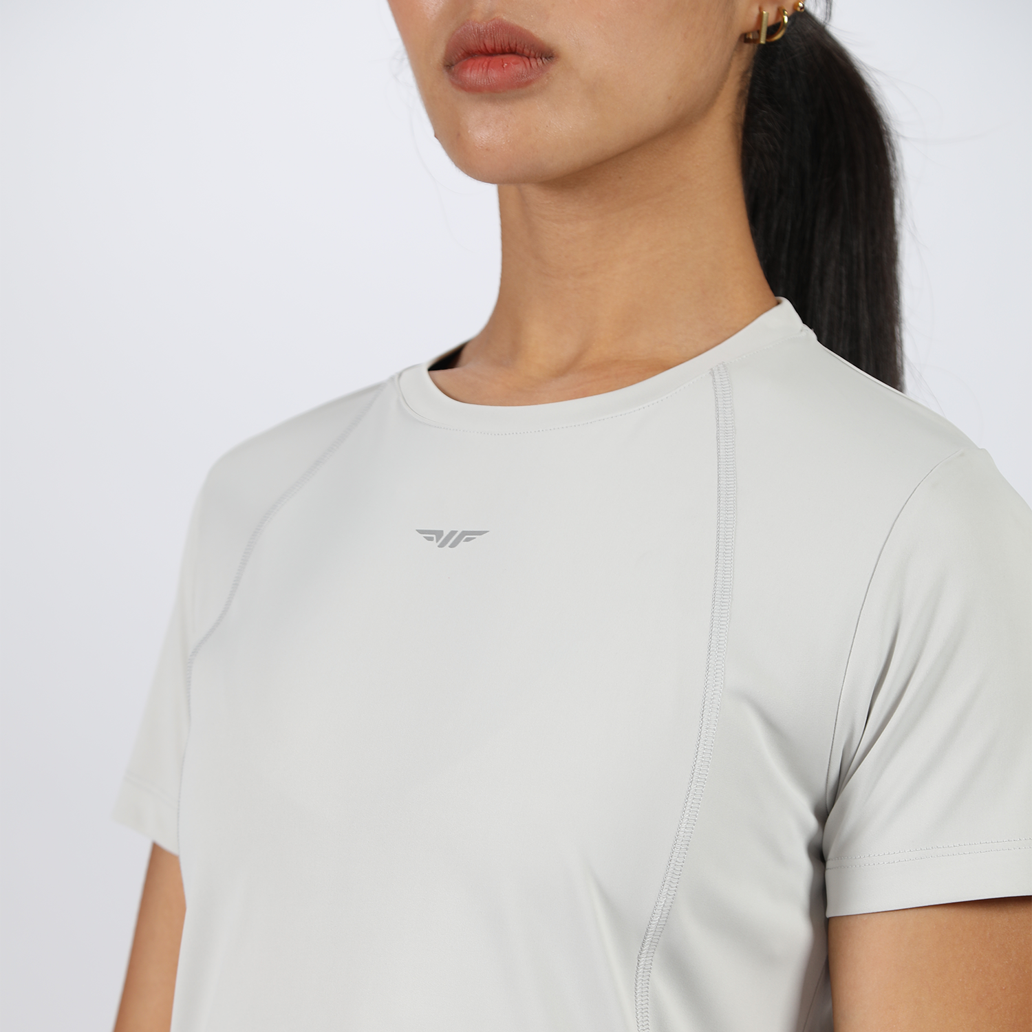 close up view for fit woman wearing t-shirt nimbus cloud with logo 