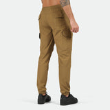 a back view for fit man wearing  cargo Breen brown with pants and shoes black 