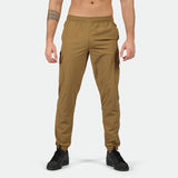 a fit man wearing  cargo Breen brown  with shoes black 