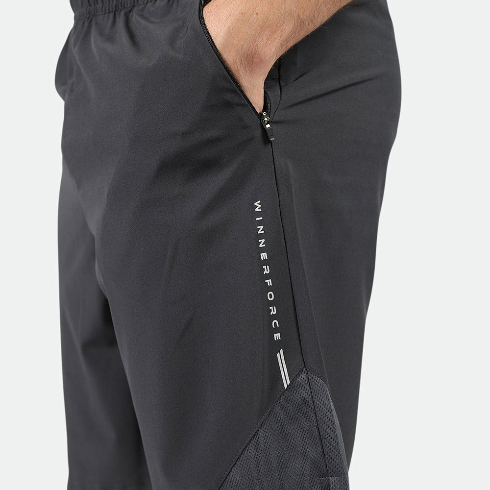 close up view for short phantom  grey with logo  with zipper and little mesh fabric 