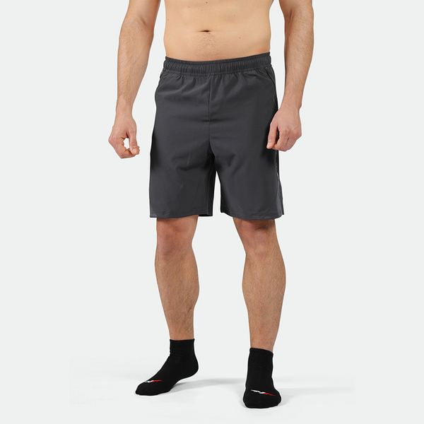 a fit man wearing short  phantom grey with socks black 