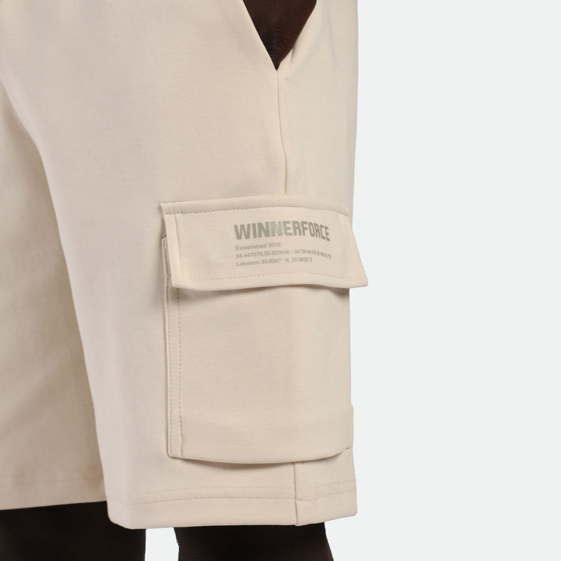close up view for pocket of short light beige with logo 