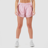 a fit woman wearing pink short 2 in 1 with shoes white ,plus the background is light grey 