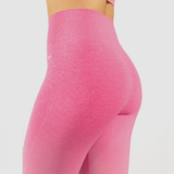   close up view for a women wearing legging pink