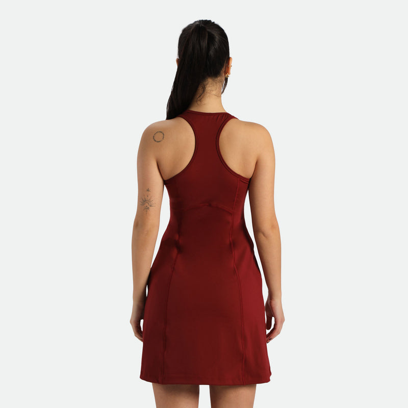a back view for fit woman wearing  dress red 