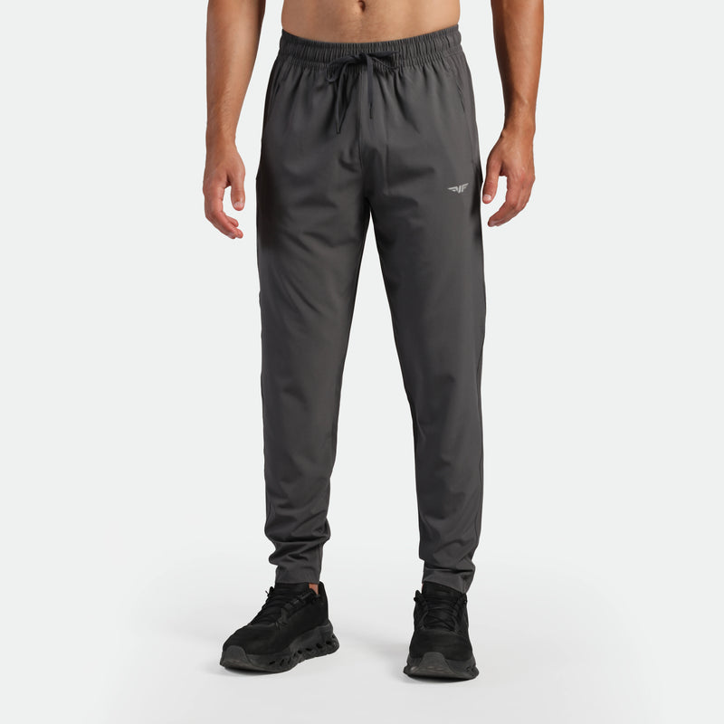 a fit man wearing jogger pants Poppy seed grey 