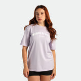 a fit woman wearing t-shirt purple with short black 