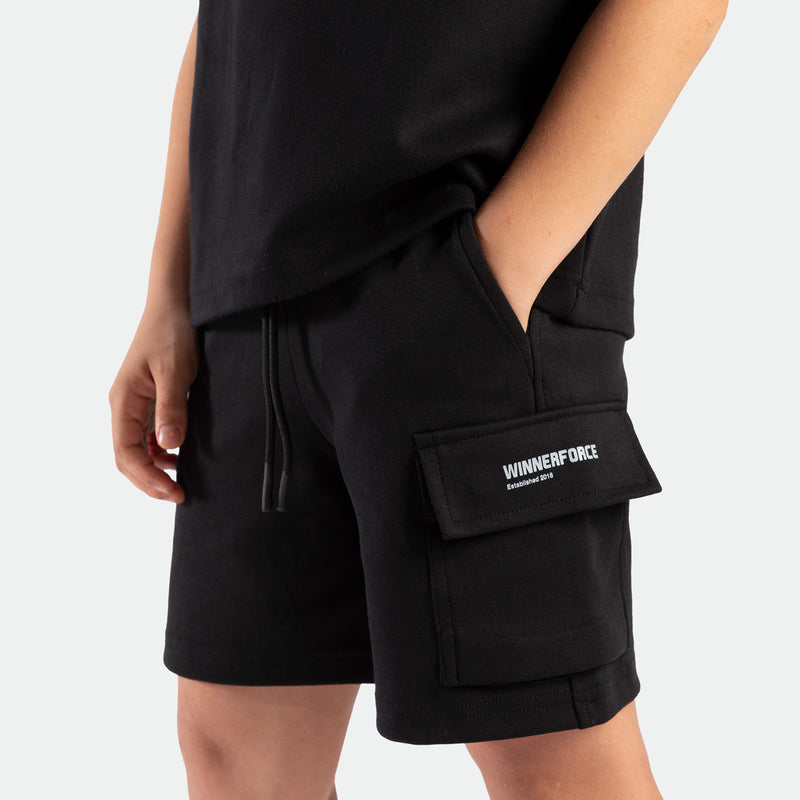 close down view for boy wearing short black with logo 