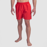 a fit man wearing short red with logo 