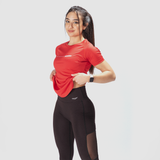 a fit woman wearing t-shirt red with logo ,plus the wearing a legging black with little mesh fabric and logo  