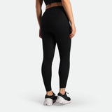 a back view for fit woman wearing legging black with shoes 