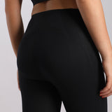 close up view for back view of woman wearing legging black 