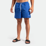 a fit man wearing short ROYAL BLUE