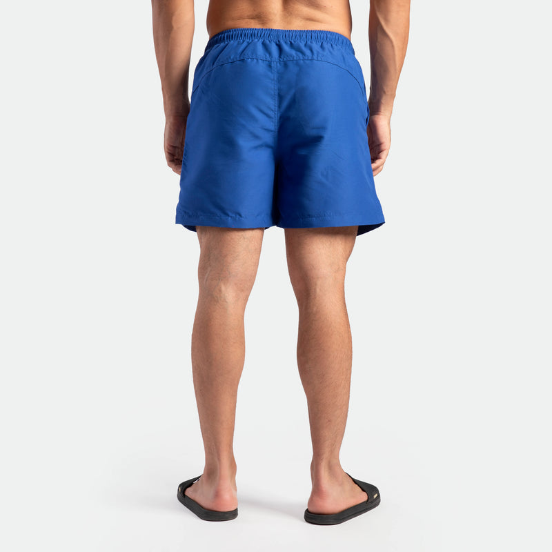 a back view for fit man wearing short ROYAL BLUE