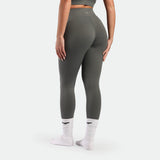 a bac view for fit woman wearing legging sage grey terrazzo socks white 