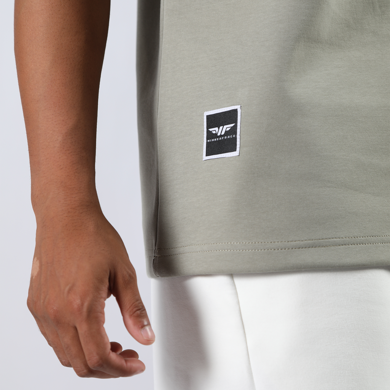 close up view for logo black of t-shirt seagrass green 