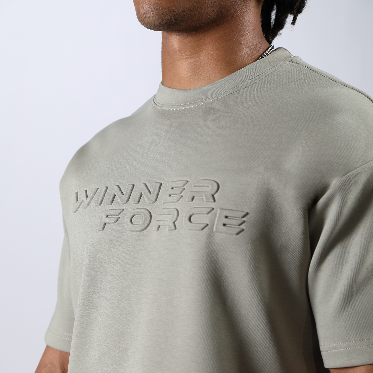 close up view for t-shirt seagrass green with logo 