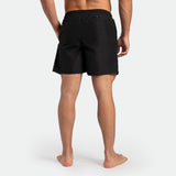 a back view for fit man wearing short black 
