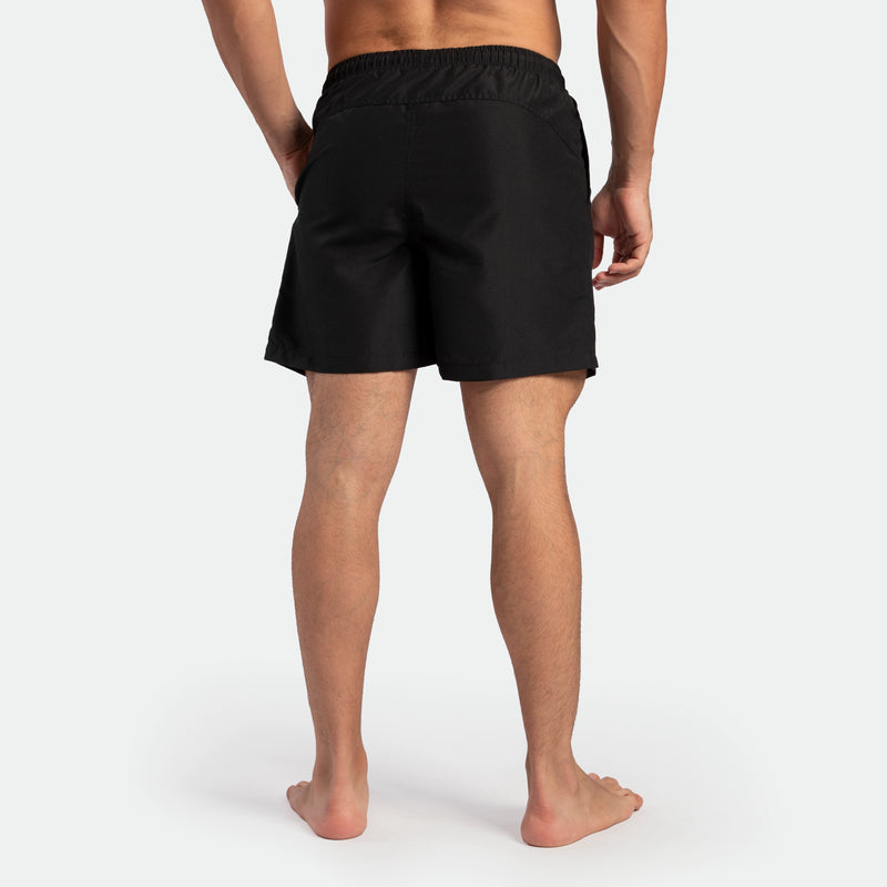 a back view for fit man wearing short black 