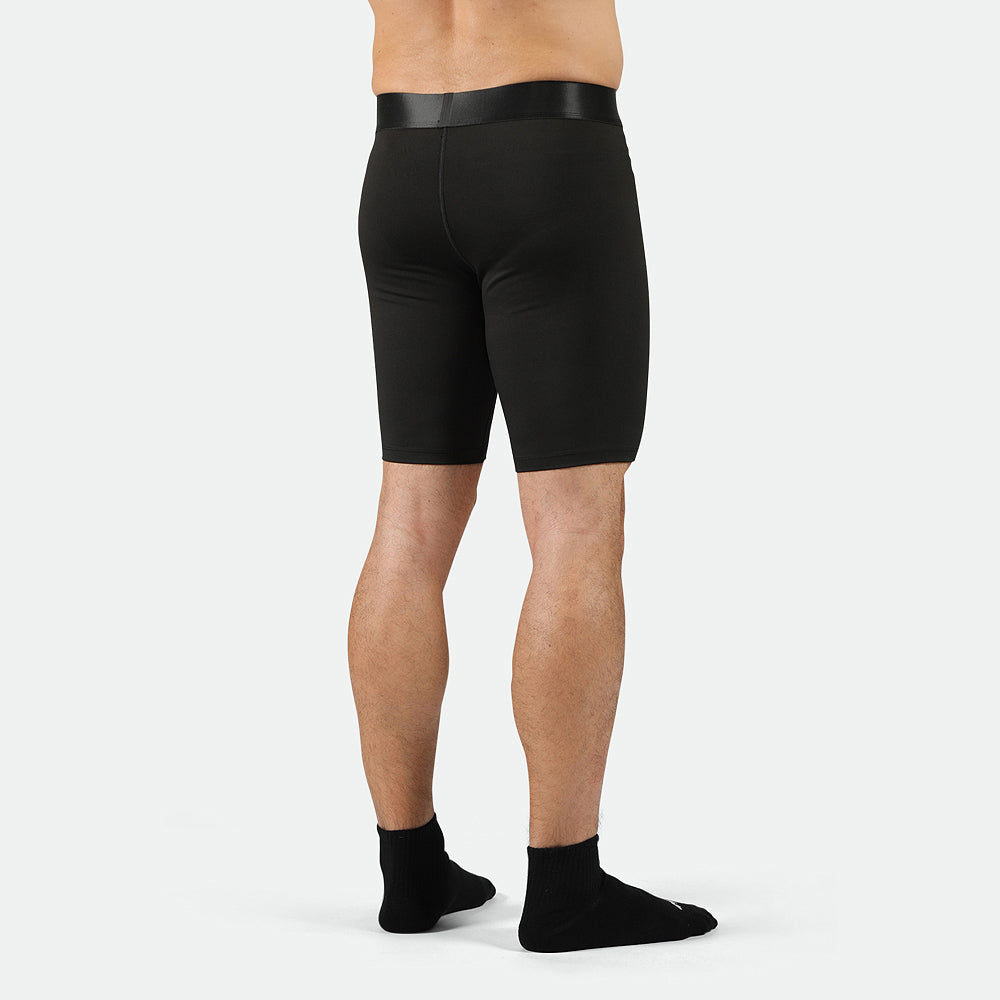 a back view  for fit man wearing short black with socks black 