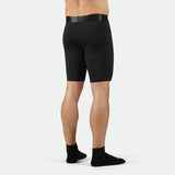 a back view  for fit man wearing short black with socks black 
