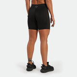 a back view for fit woman wearing short black with shoes black 