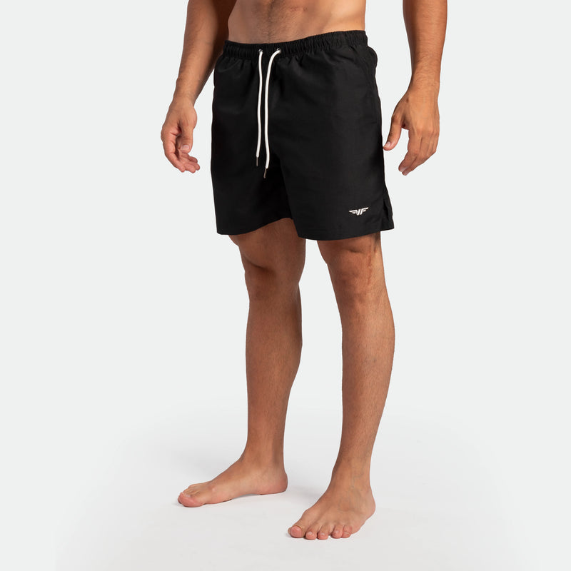 a fit man wearing short black 