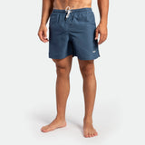 a fit man wearing short ensign blue 