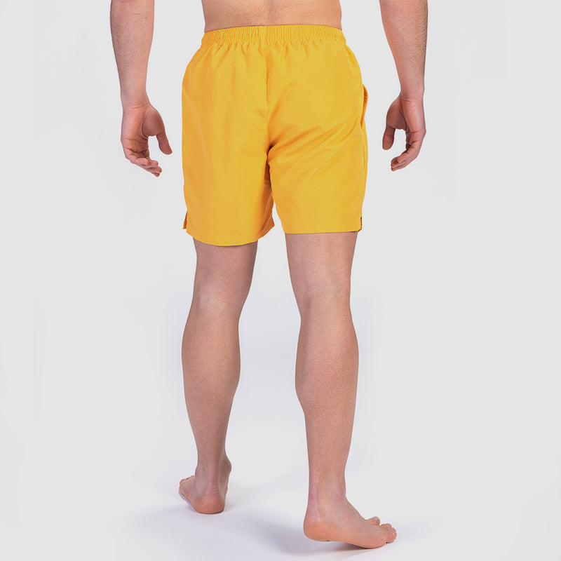 a back view for fit man wearing  short canary yellow 