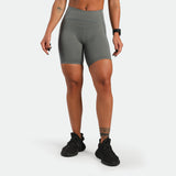 a fit woman short sage grey ,plus the shoes black 