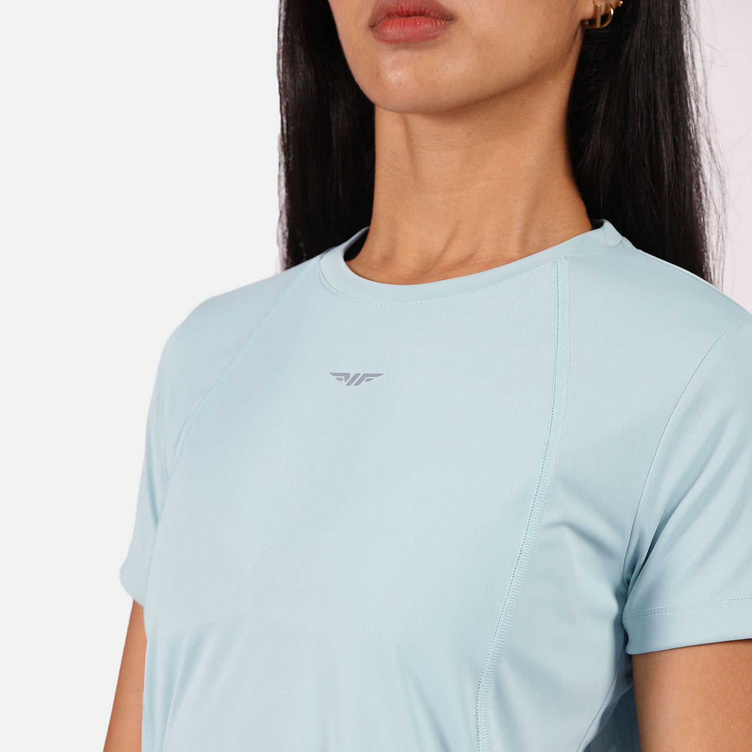 close up view for fit woman  wearing t-shirt sky blue with logo 