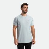 a fit man wearing t-shirt sky blue with pants black 